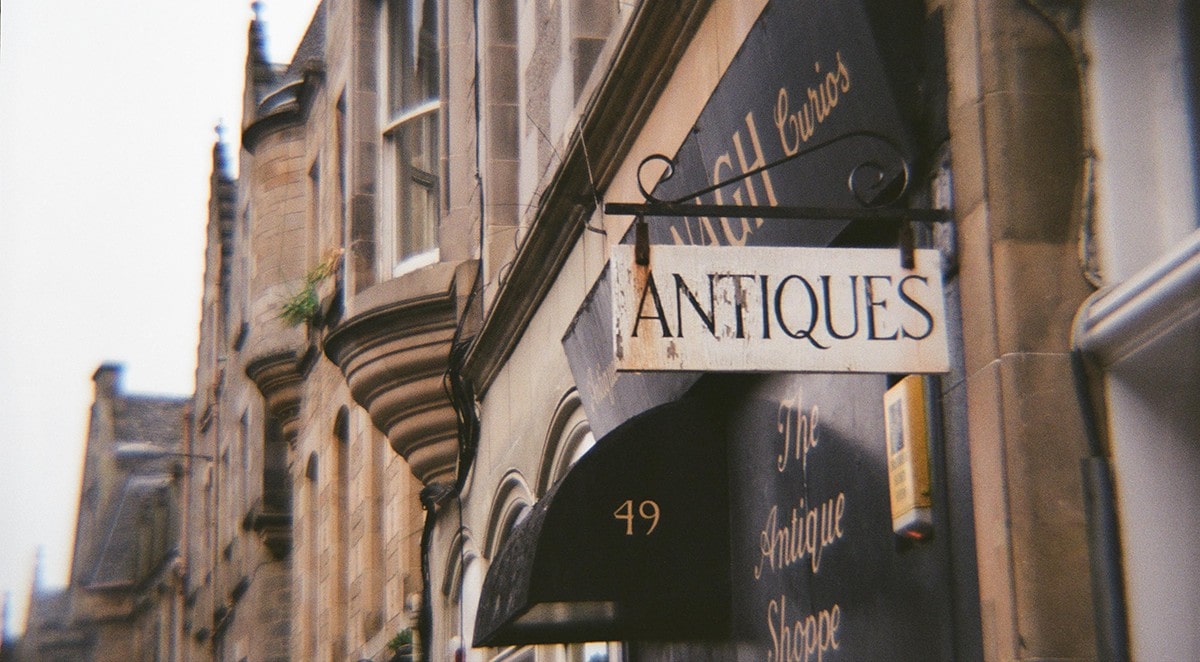 The outside of an antiques shop.