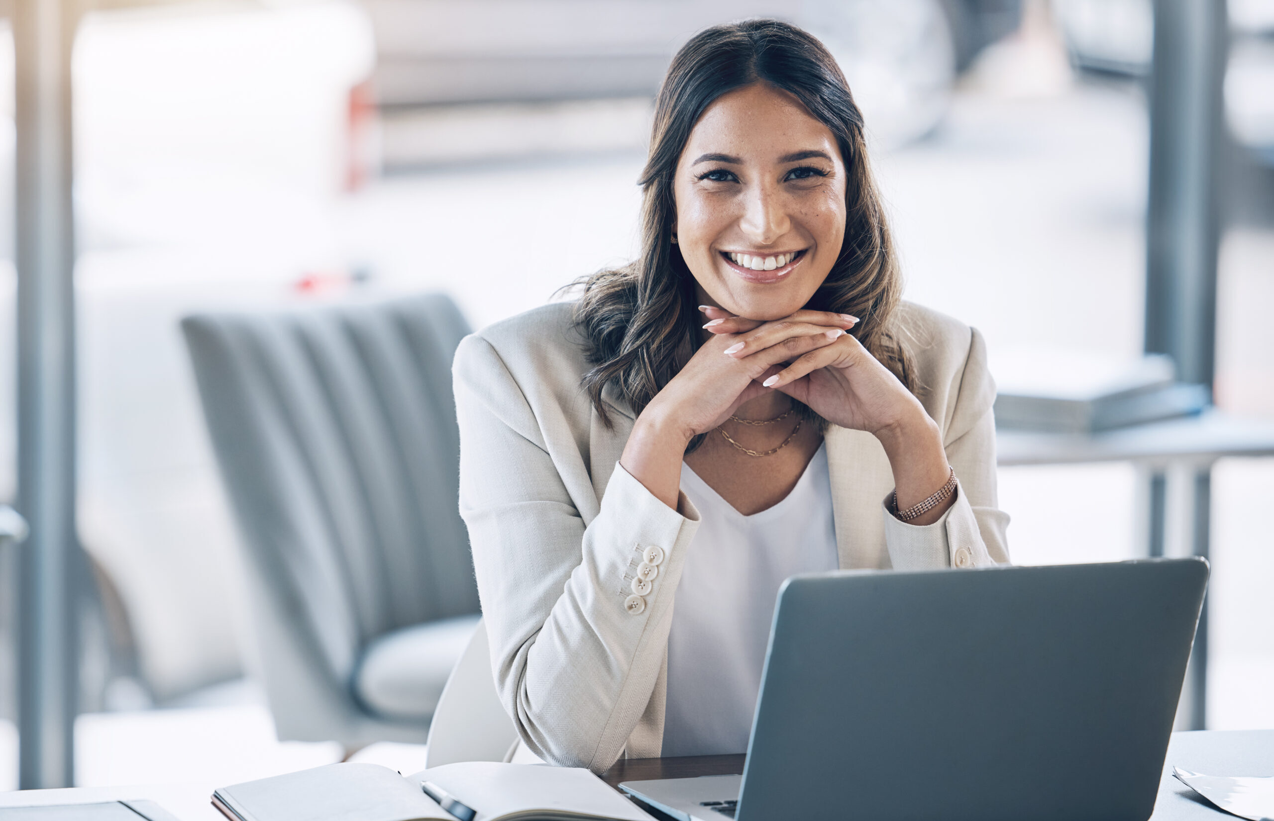Woman, portrait and laptop in office planning, legal consulting or policy review feedback in corporate law firm. Smile, happy and attorney lawyer on technology in case research or schedule management