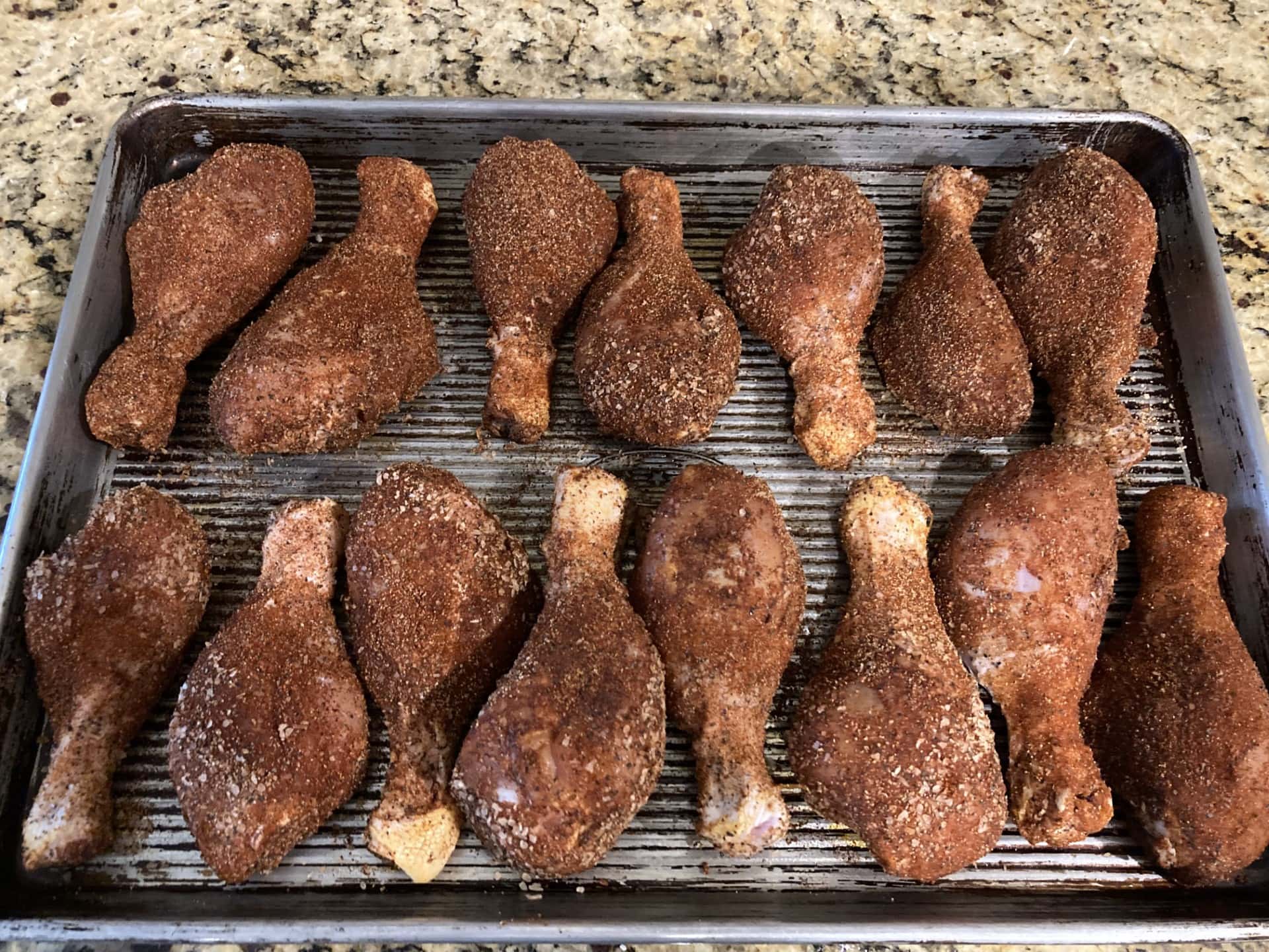 Uncooked chicken drumsticks.