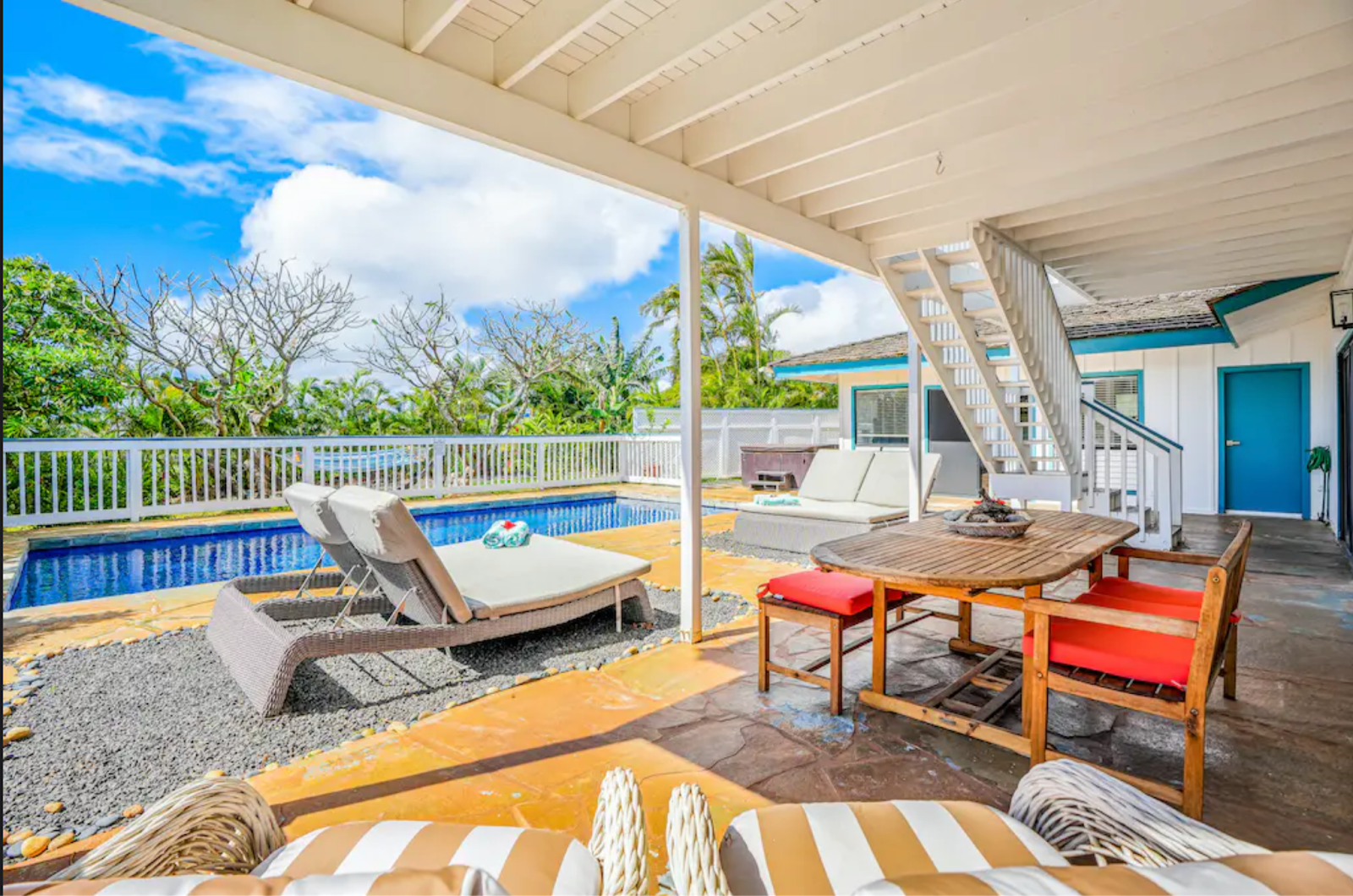 Pool deck of the four-bedroom Vacasa rental in Kauai we booked for 2024.